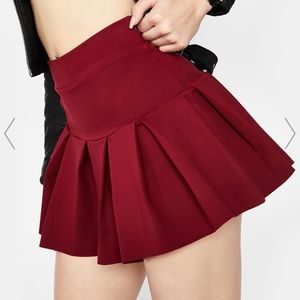 “Wicked scholar pleated mini skirt”